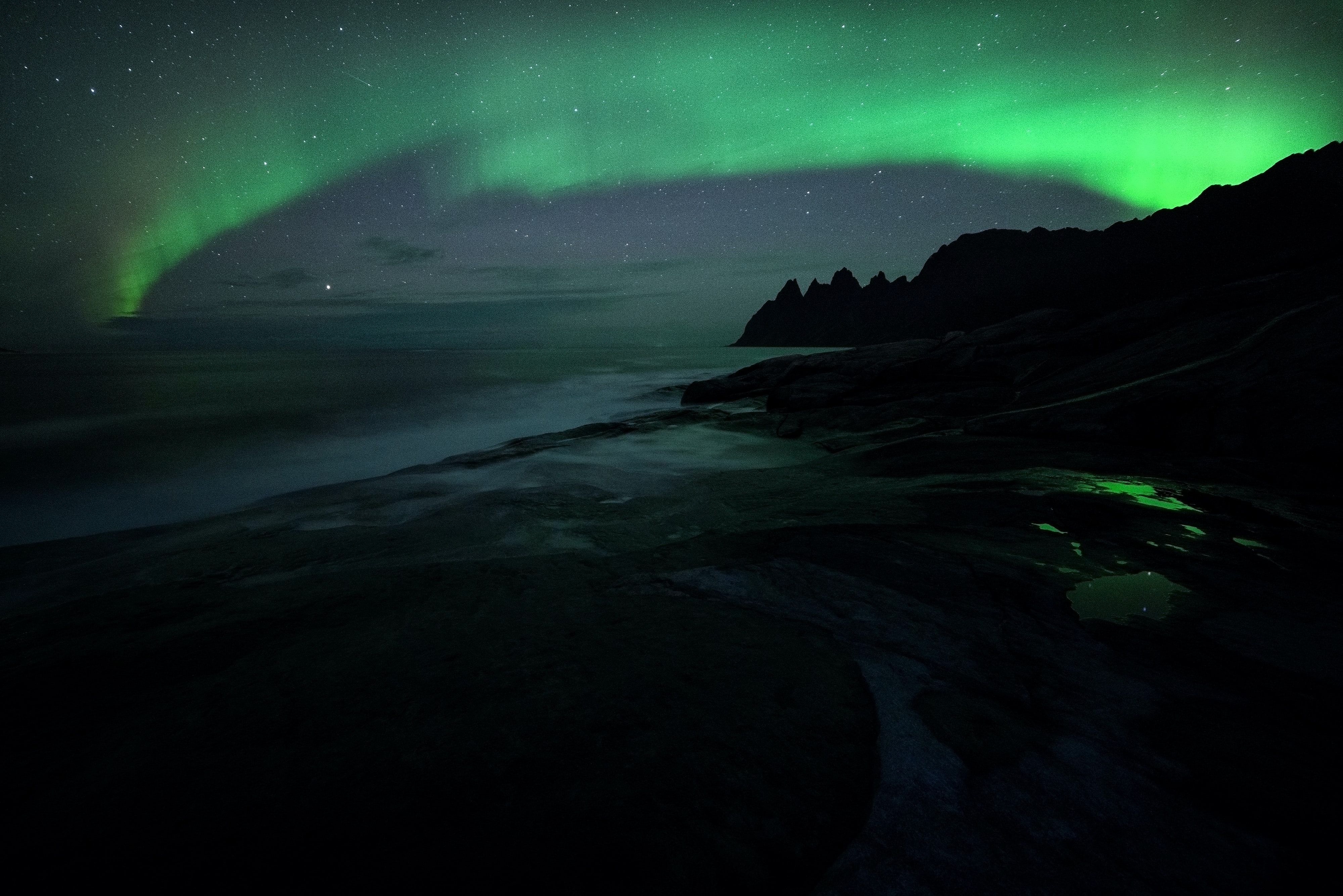 &ldquo;Northern lights over a mountain&rdquo;